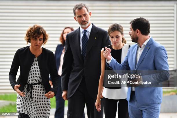 Spain's King Felipe VI and Queen Letizia arrive the Hospital del Mar in Barcelona to visit victims of the Barcelona attack on August 19 two day after...
