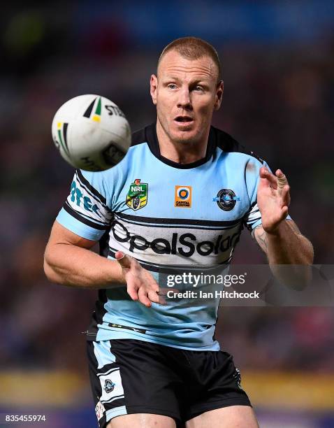 Luke Lewis of the Sharks looks to catch the ball during the round 24 NRL match between the North Queensland Cowboys and the Cronulla Sharks at...