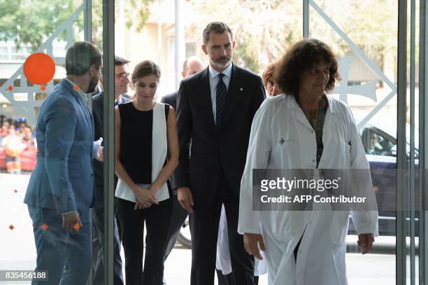 Spain's King Felipe VI and Queen Letizia arrive at the Sant Pau hospital in Barcelona to visit medical staff and victims of the Barcelona attack on...