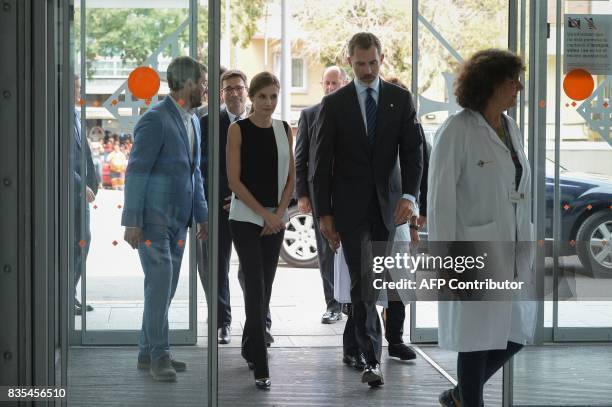 Spain's King Felipe VI and Queen Letizia arrive at the Sant Pau hospital in Barcelona to visit medical staff and victims of the Barcelona attack on...