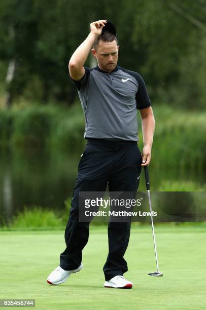 Tom Lewis of England reacts after missing a putt on the 18th during day three of the Saltire Energy Paul Lawrie Matchplay at Golf Resort Bad...