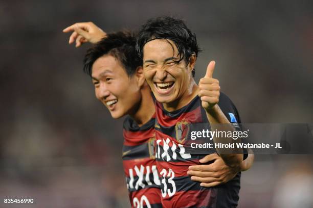 Mu Kanazaki of Kashima Antlers celebrates scoring his side's second goal with his team mate Kento Misao during the J.League J1 match between Kashima...