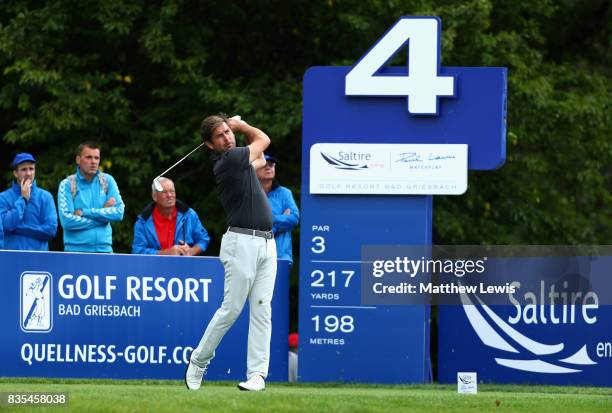 Robert Rock of England tees off on the 4th during day three of the Saltire Energy Paul Lawrie Matchplay at Golf Resort Bad Griesbach on August 19,...