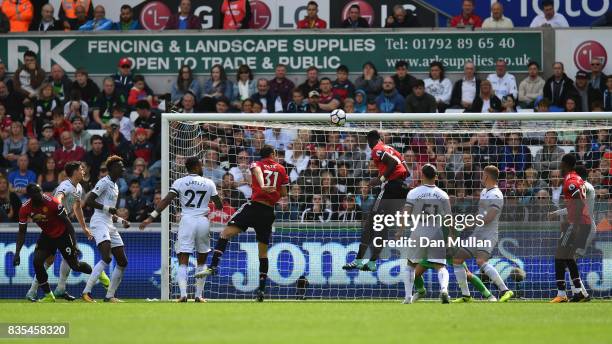 Eric Bailly of Manchester United scores his sides first goal during the Premier League match between Swansea City and Manchester United at Liberty...