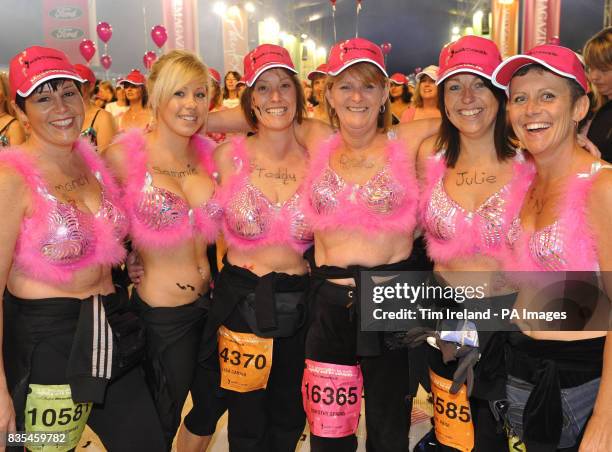 Participants dressed in decorative bras at Hyde Park, central London, start to walk the 26.2 mile course across London to raise money for breast...