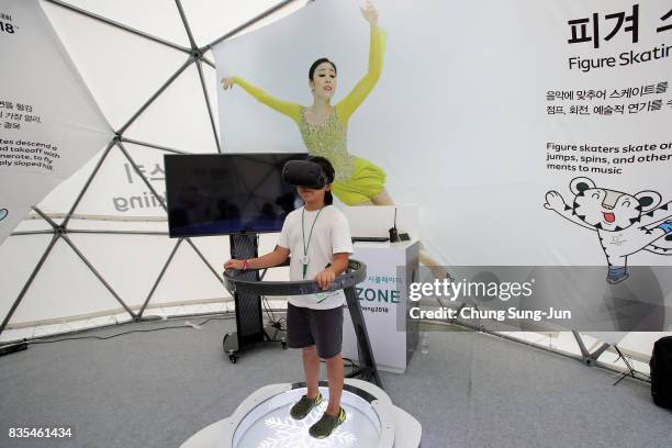 South Korean girl enjoy the PyeongChang Winter Olympics booth next to 'Bobsleigh In the City' event on August 19, 2017 in Seoul, South Korea. The...