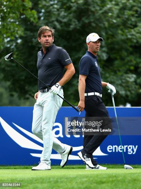 Robert Rock of England and Marcel Siem of Germany stand on the 4th tee during day three of the Saltire Energy Paul Lawrie Matchplay at Golf Resort...