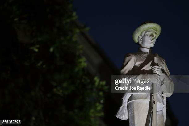 Confederate monument featuring a statue of a Confederate soldier is seen in front of the Hernando County Courthouse in the midst of a national...