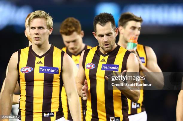 Luke Hodge of the Hawks leaves the field after losing the round 22 AFL match between the Carlton Blues and the Hawthorn Hawks at Etihad Stadium on...