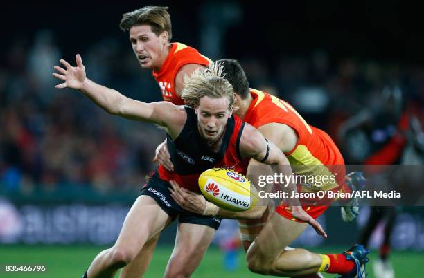 Darcy Parish of the bombers in action during the round 22 AFL match between the Gold Coast Suns and the Essendon Bombers at Metricon Stadium on...