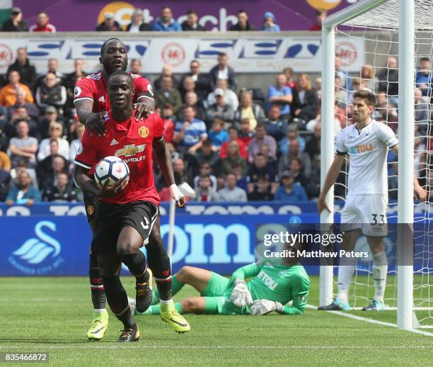 Eric Bailly of Manchester United celebrates scoring their first goal during the Premier League match between Swansea City and Manchester United at...