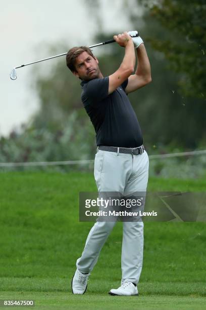 Robert Rock of England plays his second shot on the 5th during day three of the Saltire Energy Paul Lawrie Matchplay at Golf Resort Bad Griesbach on...