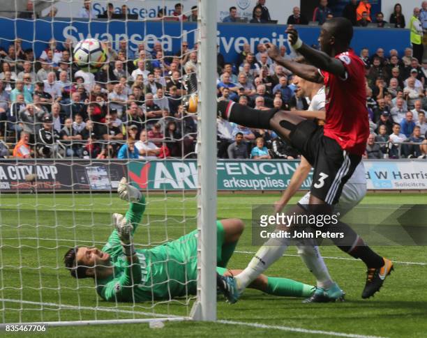 Eric Bailly of Manchester United scores their first goal during the Premier League match between Swansea City and Manchester United at Liberty...