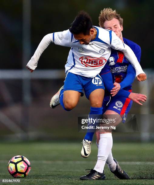 Mitchell Rooke of Manly United and Yu Kuboki of Sydney Olympic challenge for the ball during the NSW NPL 1 Elimination Final between Manly United FC...