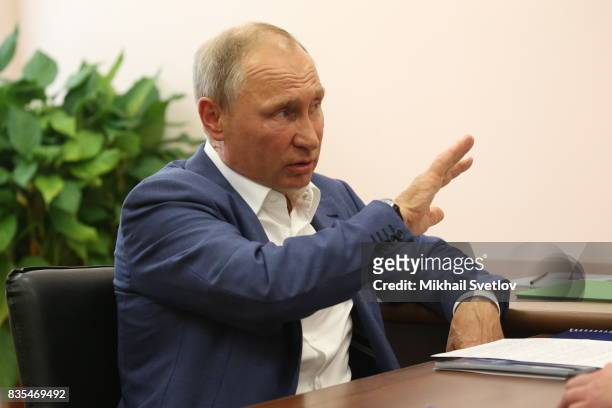 Russian President Vladimir Putin speaks during his meeting with Governor of Sevastopol Dmitry Ovsyannikov on August 18, 2017 on Sevastopol, Crimea....