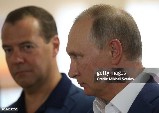 Russian President Vladimir Putin and Prime Minister Dmitry Mevedev observe a newly opened school on August 18, 2017 on Sevastopol, Crimea. Vladimir...