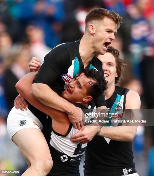 Robbie Gray of the Power celebrates a goal with Sam Powell-Pepper of the Power during the 2017 AFL round 22 match between the Western Bulldogs and...