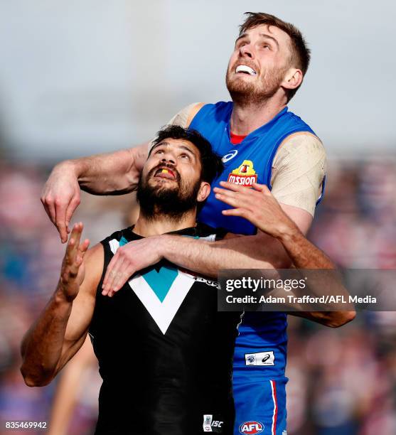 Jordan Roughead of the Bulldogs and Paddy Ryder of the Power compete in a ruck contest during the 2017 AFL round 22 match between the Western...