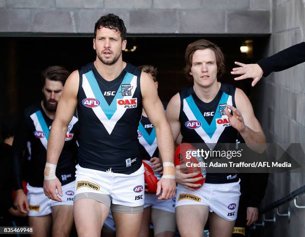 Travis Boak and Jared Polec of the Power come up the race during the 2017 AFL round 22 match between the Western Bulldogs and the Port Adelaide Power...