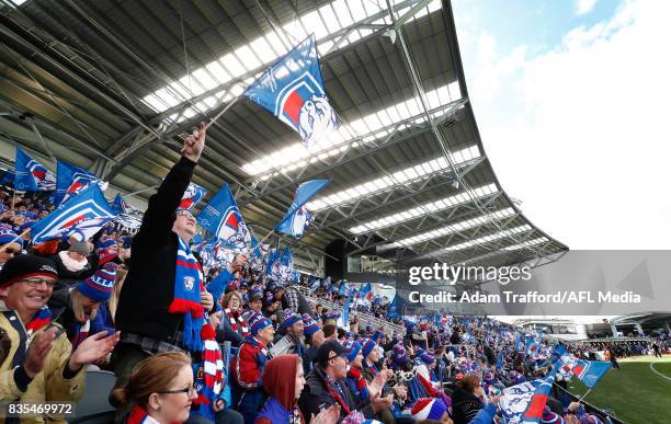 Bulldogs supporters cheer during the 2017 AFL round 22 match between the Western Bulldogs and the Port Adelaide Power at Mars Stadium on August 19,...
