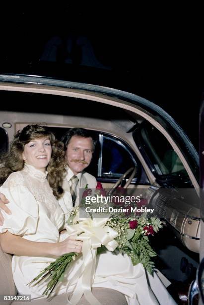 Dale and Teresa Earnhardt in the honeymoon car after their wedding on November 14, 1982 in Mooresville, North Carolina.