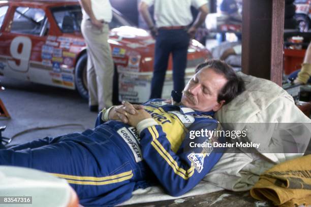 Dale Earnhardt takes a nap before the race at the Summer 500 on July 19, 1987 at Pocono International Raceway in Long Pond, Pennsylvania. Dale's...