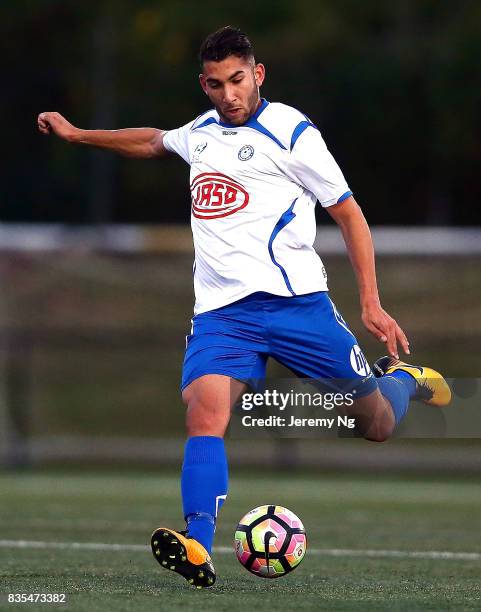 George Timotheou of Sydney Olympic kicks the ball during the NSW NPL 1 Elimination Final between Manly United FC and Sydney Olympic FC at Cromer Park...