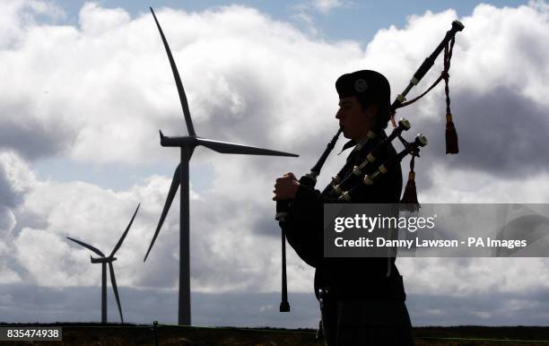 Piper David Wilton helps officially open Europe's biggest onshore wind farm, Whitelee Windfarm, on the outskirts of Glasgow.