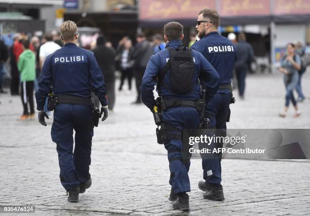 Police patrol at the Turku Market Square, Finland on August 19, 2017. Two people were killed and six were injured in a stabbing spree in the Finnish...