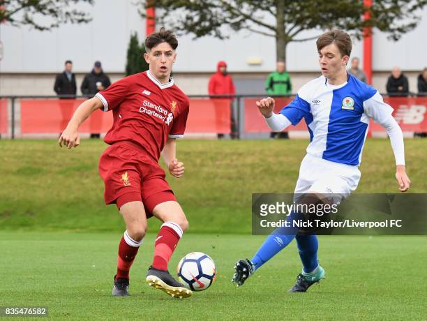 Anthony Driscoll-Glennon of Liverpool and Callum Wright of Blackburn Rovers in action during the Liverpool v Blackburn Rovers U18 Premier League game...