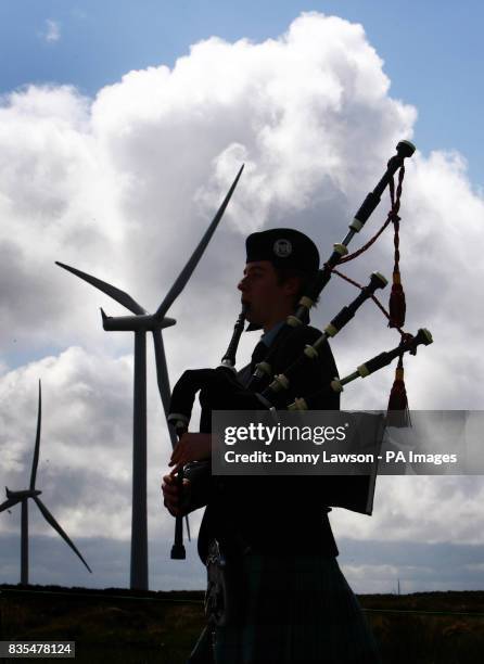 Piper David Wilton helps officially open Europe's biggest onshore wind farm, Whitelee Windfarm, on the outskirts of Glasgow.