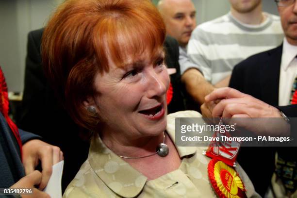 Member of the BNP offers a KitKat in front of MP Hazel Blears after Labour candidate Matt Mold won the Irwell Riverside by-election.