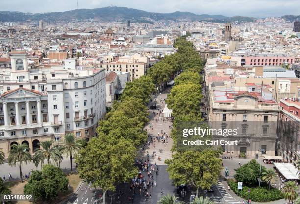 Trees line the Las Ramblas throughfare, on August 19, 2017 in Barcelona, Spain. A nationwide manhunt continues for Younes Abouyaaqoub, now named by...