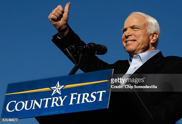 Republican presidential nominee Sen. John McCain gives the thumbs up during a campaign rally at Indianapolis International Airport November 3, 2008...
