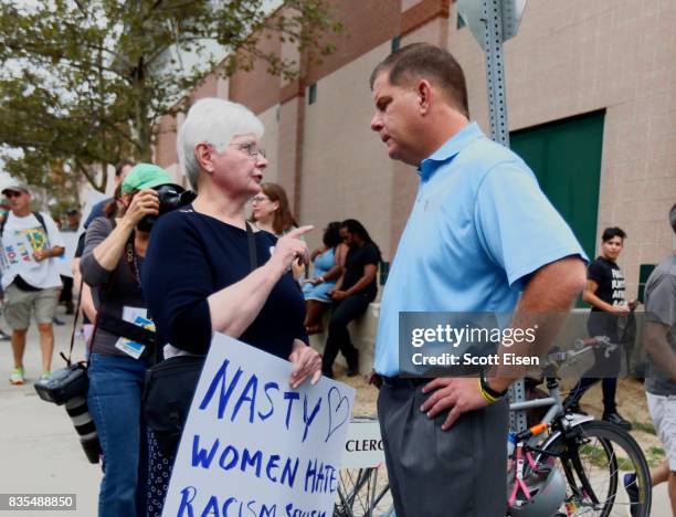 Boston Mayor Marty Walsh greets protesters before the counter protest to a planned Free Speech rally on Boston Common on August 19, 2017 in Boston,...