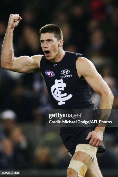Matthew Kreuzer of the Blues celebrates a goal during the round 22 AFL match between the Carlton Blues and the Hawthorn Hawks at Etihad Stadium on...