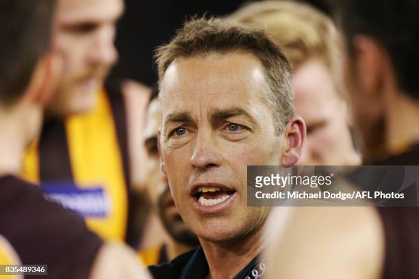Hawks head coach Alastair Clarkson speaks to his players during the round 22 AFL match between the Carlton Blues and the Hawthorn Hawks at Etihad...