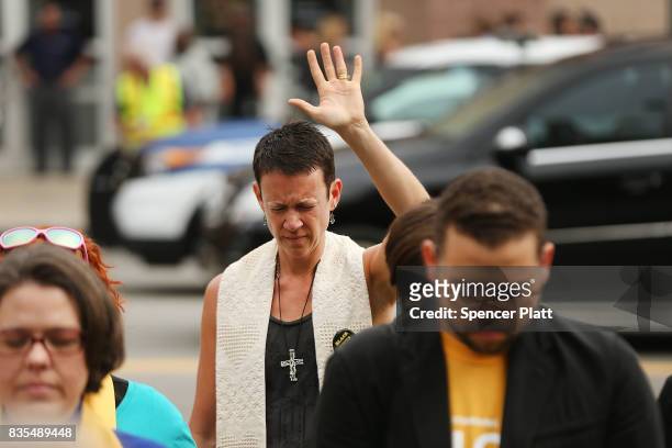 Marchers participate in an interfaith prayer service in Boston before marching against a planned 'Free Speech Rally' just one week after the violent...