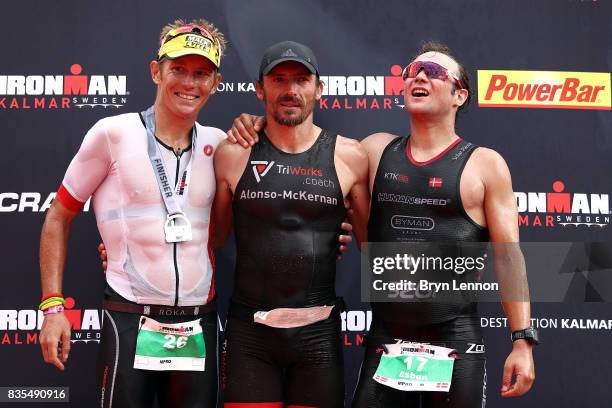 Cameron Wurf of Australia , Clemente Alonso-McKernan of Spain and Esben Hovgaard of Denmark stand on the podium after IRONMAR Kalmar on August 19,...