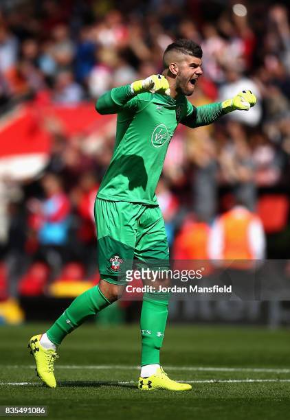 Fraser Forster of Southampton celebrates his sides first goal during the Premier League match between Southampton and West Ham United at St Mary's...