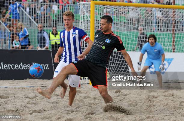 Players of Hertha BSC and Hamburger SV battle for the ball on day 1 of the 2017 German Beach Soccer Championship on August 19, 2017 in Warnemunde,...