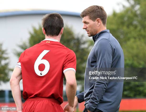 Liverpool U18 Manager Steven Gerrard talks to his captain Liam Coyle during the Liverpool v Blackburn Rovers U18 Premier League game at The Kirkby...