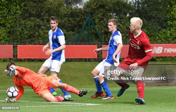 Luis Longstaff of Liverpool watches as his shot is stopped by goalkeeper Benjamin Winterbottom of Blackburn Rovers during the Liverpool v Blackburn...