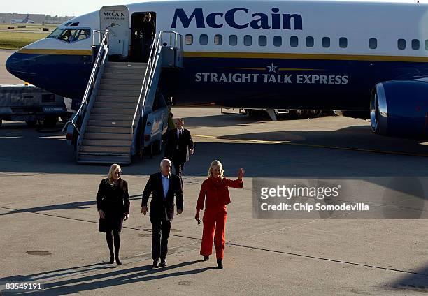 Republican presidential nominee Sen. John McCain , his daughter Meghan McCain and his wife Cindy McCain walk from the "Straight Talk Express"...