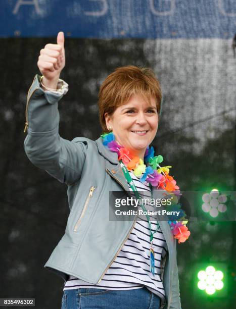 First Minister Nicola Sturgeon gives the thumbs up as she addresses the assembled crowd at Glasgow Pride on August 19, 2017 in Glasgow, Scotland. The...