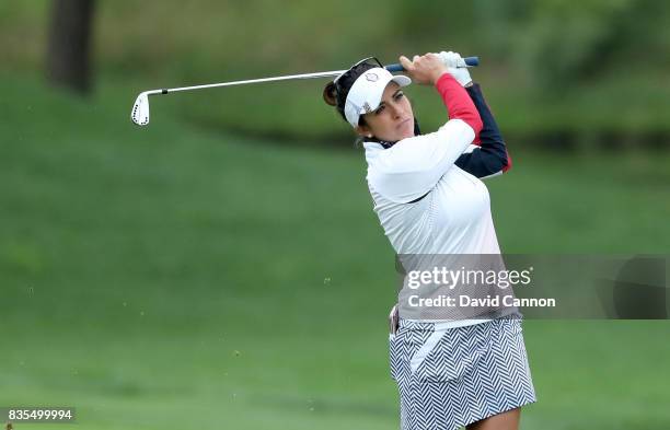 Gerine Piller of the United States Team plays her second shot on the second hole tee in her match with Stacy Lewis against Anna Nordqvist and Georgia...