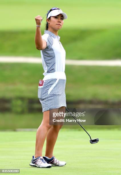 Danielle Kang of Team USA celebrates her birdie putt to win the third hole during the morning foursomes matches of the Solheim Cup at the Des Moines...