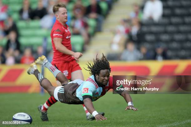 Marland Yarde of Harlequins scores his teams third try during the pre season match between Harlequins and Jersey Red at the Twickenham Stoop on...