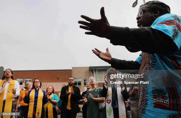 Marchers participate in an interfaith prayer service in Boston before marching against a planned 'Free Speech Rally' just one week after the violent...