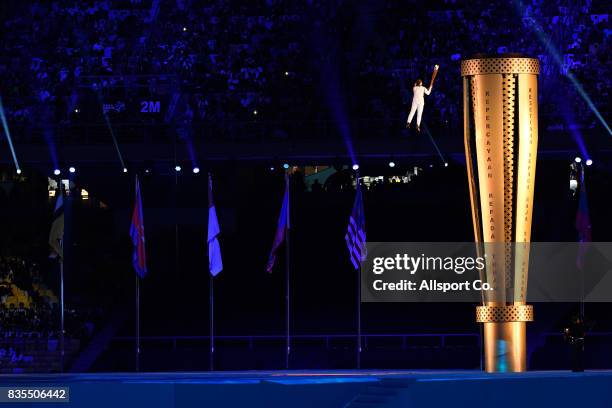 The Couldron is lgihted by Malaysian diver Nur Dhabitah Sabri during the opening ceremony at the Bukit Jalil National Stadium as part of the 2017 SEA...